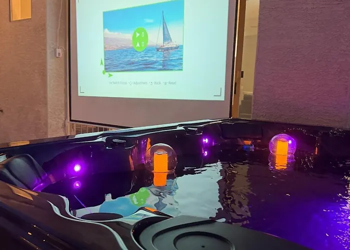 Gated With Pool Access, Hot Tub, And Projector